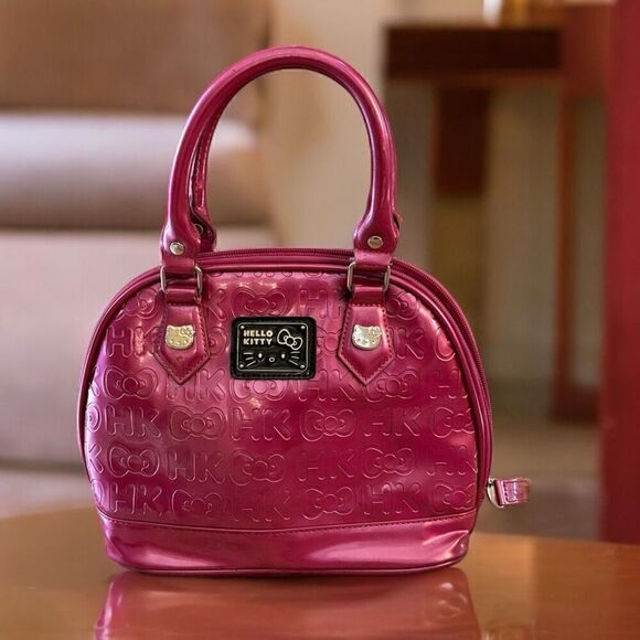 HELLO KITTY LOUNGEFLY EMBOSSED MINI BAG PINK - Picture 1 of 9
